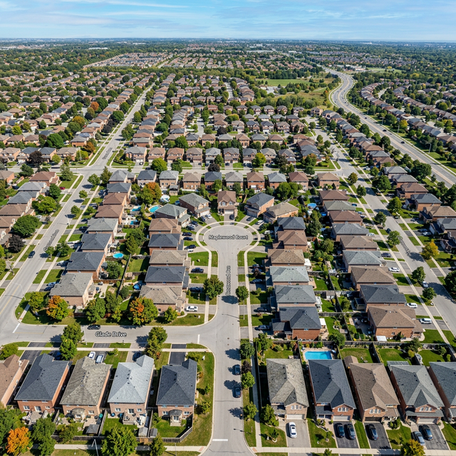 Aerial view of a Mississauga Ontario residential neighbourhood showing various asphalt shingle roofs