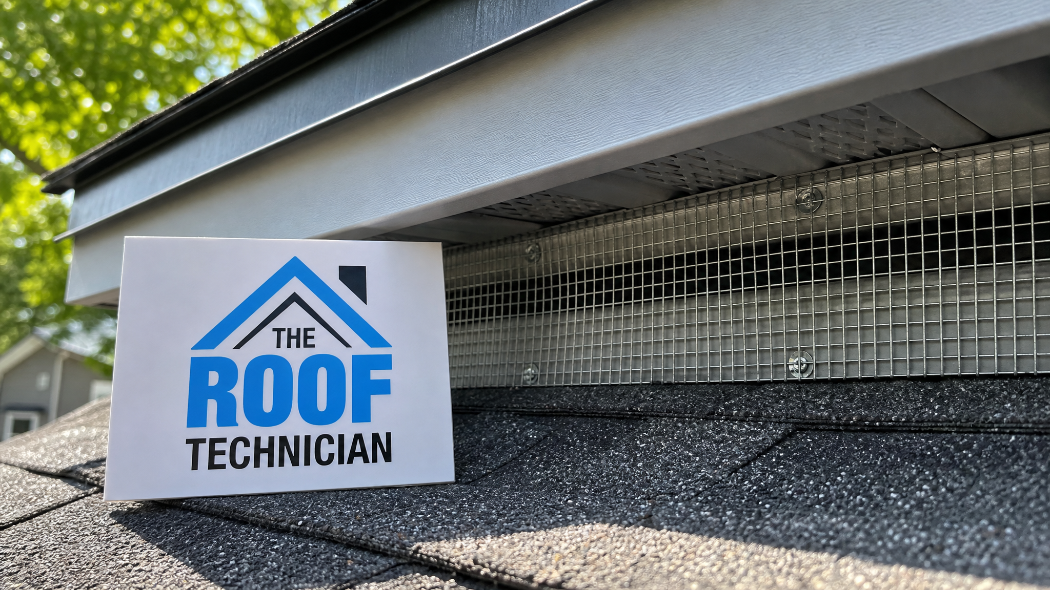 Close-up of galvanized steel mesh installed behind a soffit vent to block pest roof damage